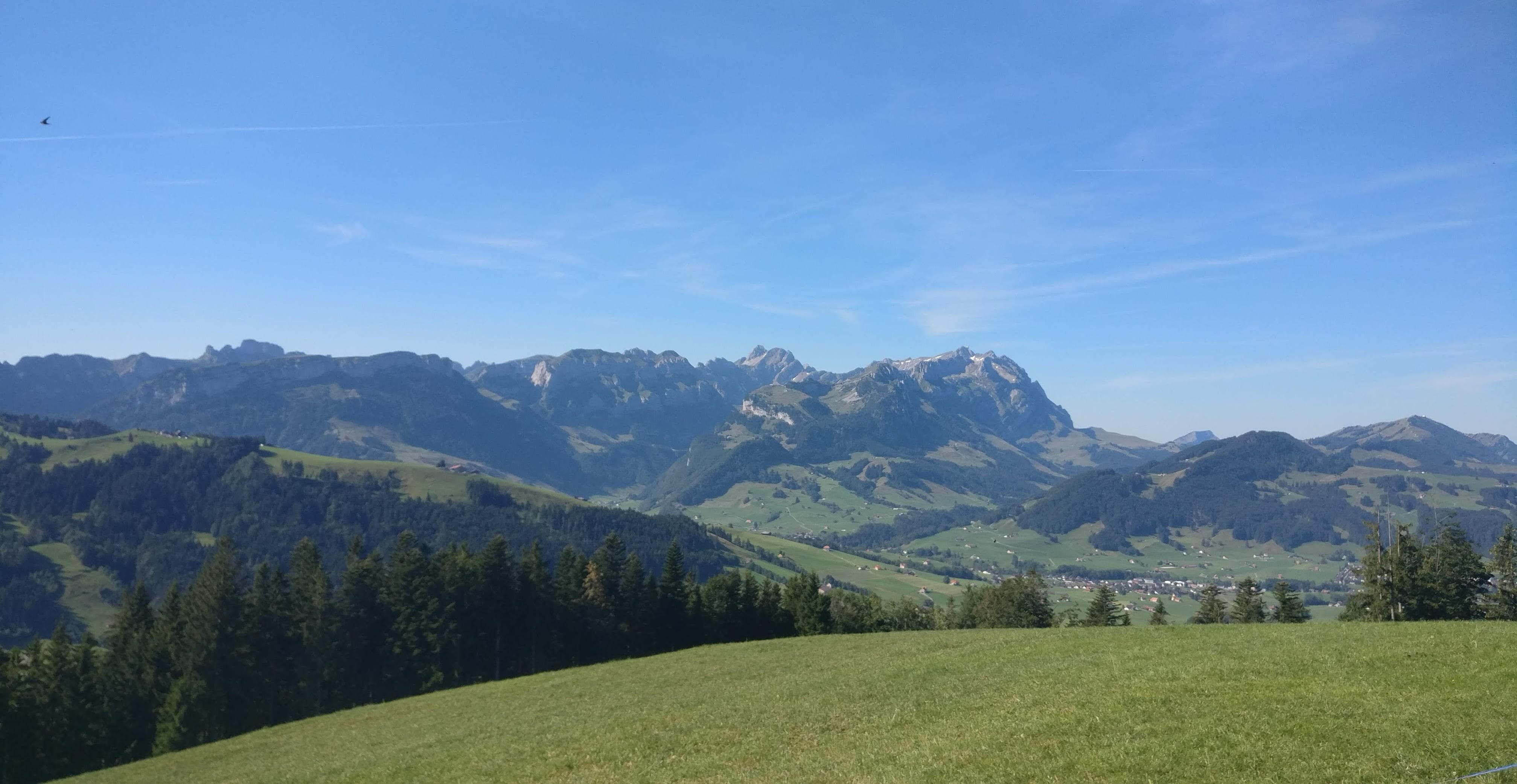 Mountainous landscape with a clear blue sky